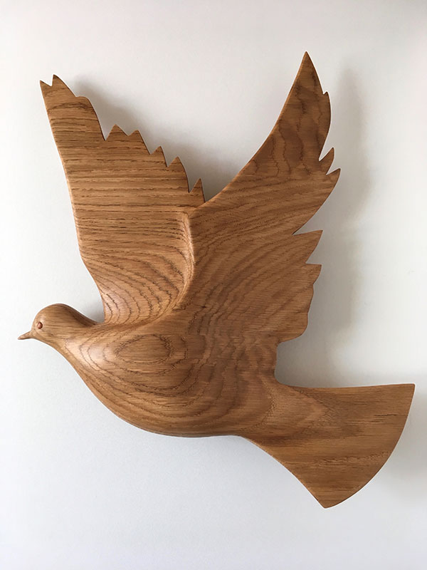 Woodcarving of a dove