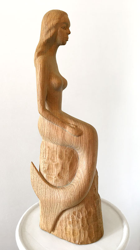 Woodcarving of a mermaid