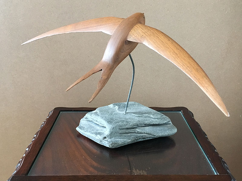 Woodcarving of a swift